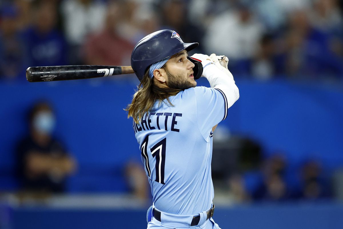 Bo Bichette #11 of the Toronto Blue Jays hits a 2-run home run in the sixth inning during a MLB game against the Houston Astros at Rogers Centre on May 1, 2022 in Toronto, Ontario, Canada.