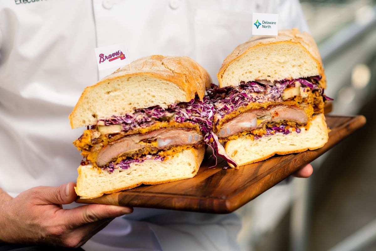 Big RiBi Sandwich at Braves Truist Park is a country fried smoked rack of ribs topped with Alabama white sauce, pickles and slaw. 1871 Grille&nbsp;near section 141.  