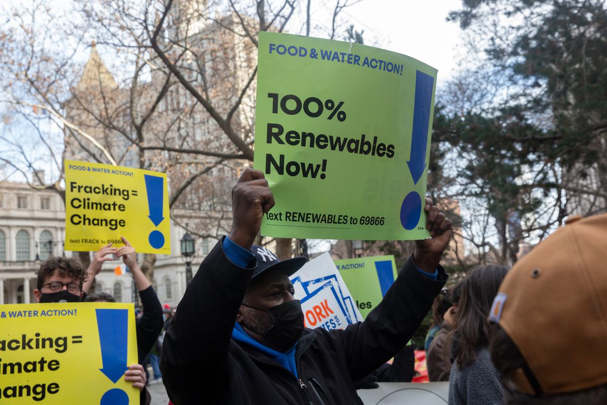 Environmental advocates rallied outside City Hall ahead of a Council vote on banning natural gas in new buildings, Dec. 15, 2021.