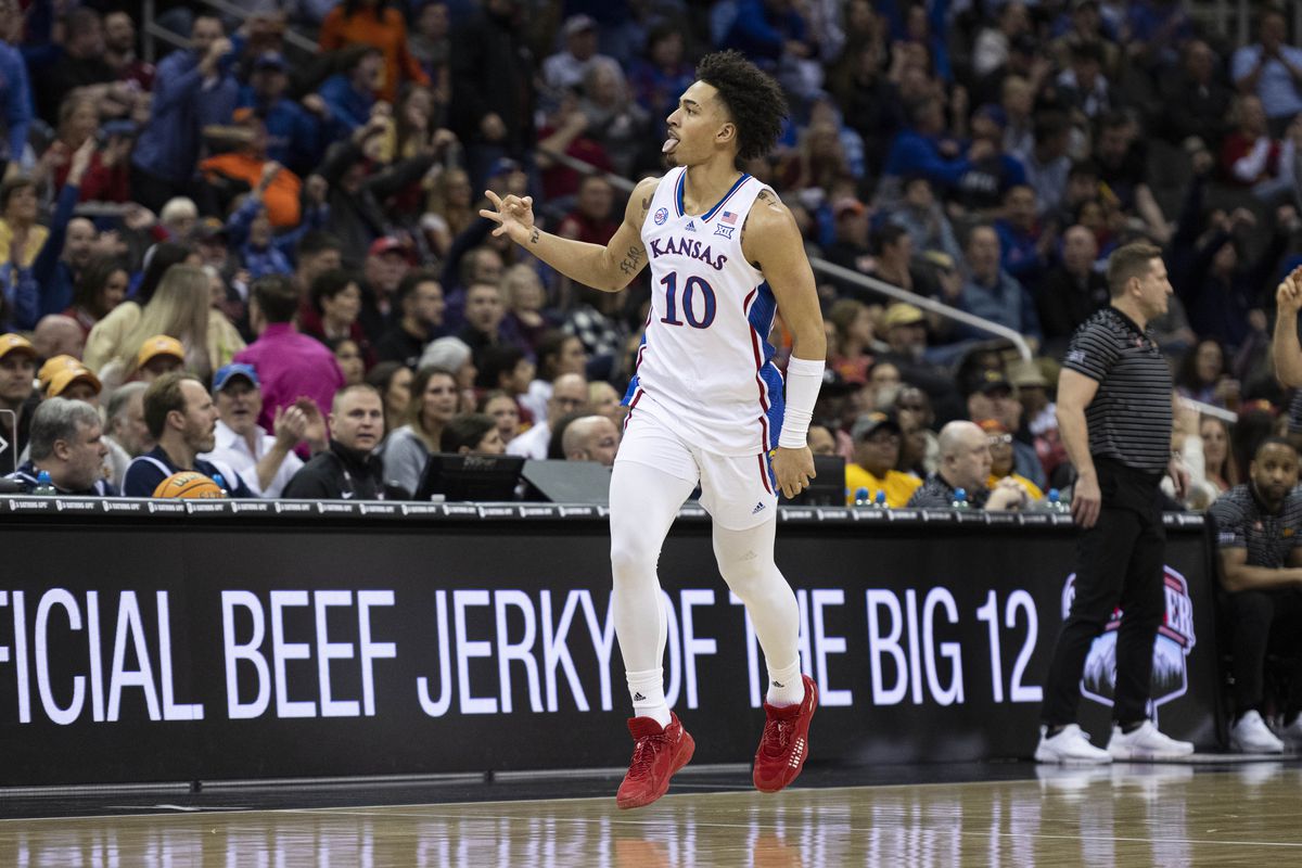 Mar 10, 2023; Kansas City, MO, USA; Kansas Jayhawks forward Jalen Wilson (10) celebrates after play against the Iowa State Cyclones in the first half at T-Mobile Center. Mandatory Credit: Amy Kontras