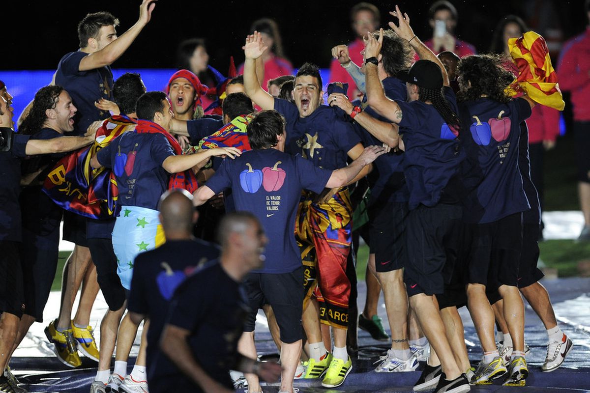BARCELONA, SPAIN - MAY 13:  FC Barcelona players celebrate during the celebrations for winning the Spanish Liga at the Camp Nou Stadium on May 13, 2011 in Barcelona, Spain.  (Photo by David Ramos/Getty Images)