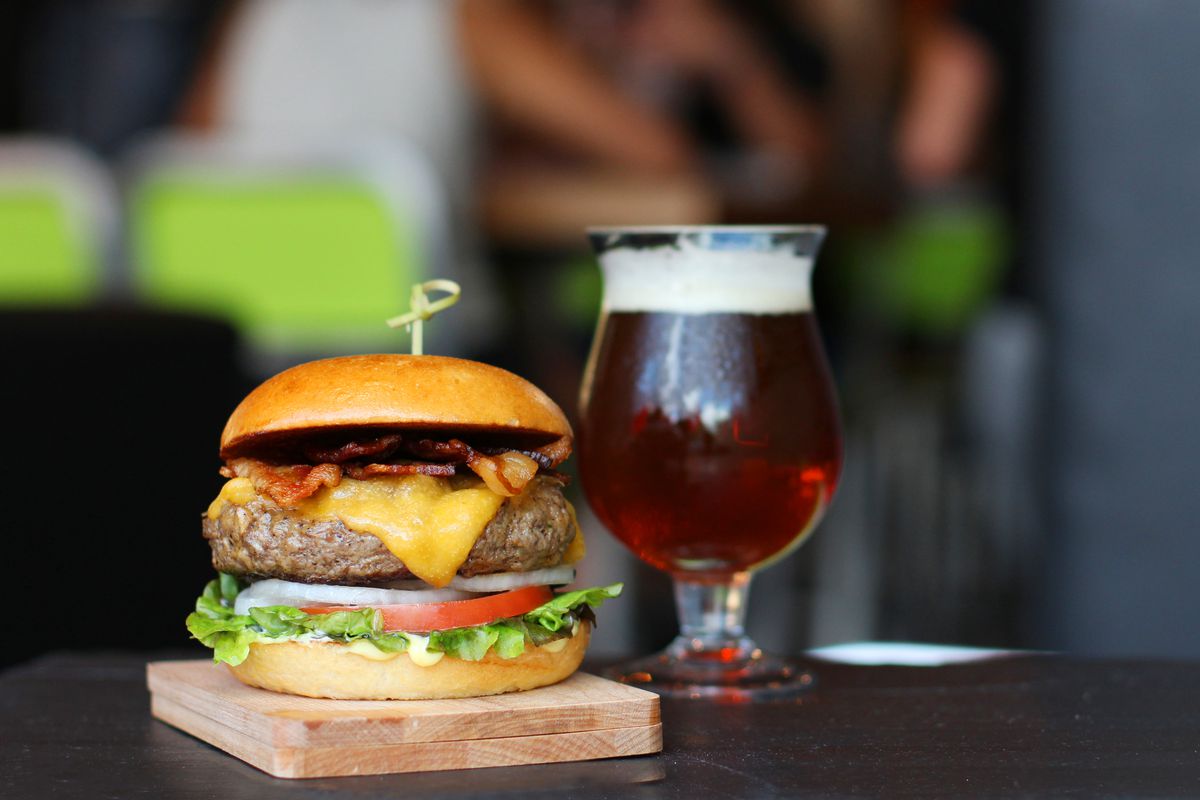 Hopdoddy’s classic cheeseburger with a beer.
