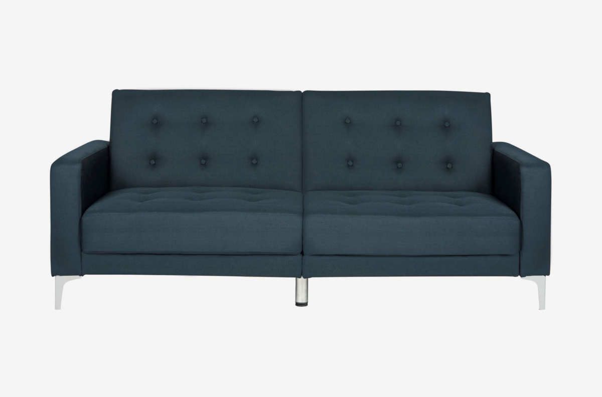 Dark blue tufted two-seat sofa.