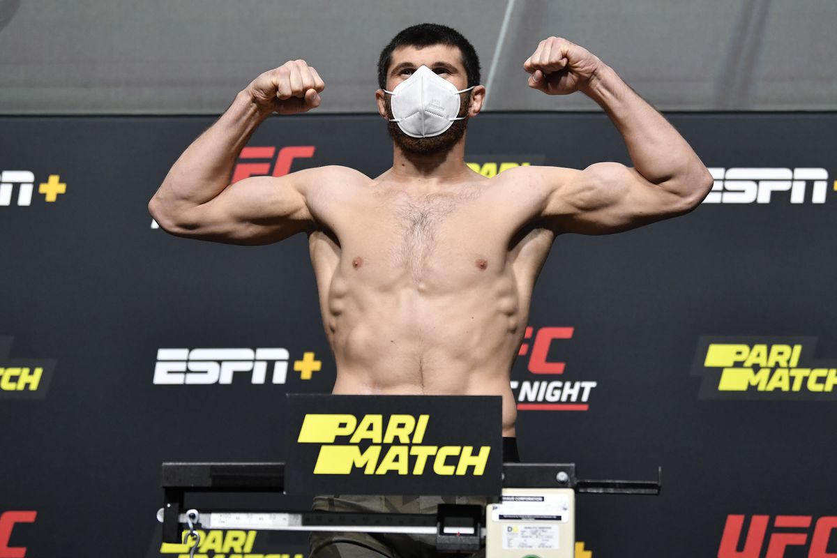 Magomed Ankalaev of Russia poses on the scale during the UFC Fight Night weigh-in at UFC APEX on August 28, 2020 in Las Vegas, Nevada.