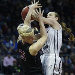 Brigham Young Cougars guard Lexi Eaton Rydalch (21) is fouled by Santa Clara Broncos forward Marie Bertholdt (15) during the WCC tournament in Las Vegas Monday, March 7, 2016. BYU won 87-67.