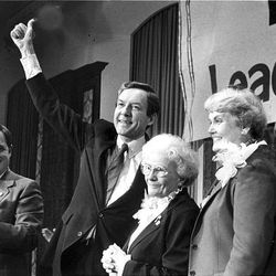 Newly re-elected Sen. Orrin Hatch stands with his mother, wife and son at his side in 1982.