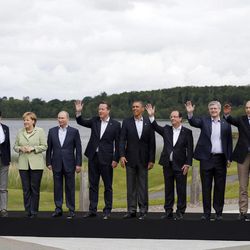 G-8 leaders from left, European Commission President Jose Manuel Barroso, Japan's Prime Minister Shinzo Abe, German Chancellor Angela Merkel, Russian President Vladimir Putin, British Prime Minister David Cameron, US President Barack Obama, French President Francois Hollande, Canadian Prime Minister Stephen Harper, Italian Prime Minister Enrico Letta and European Council President Herman Van Rompuy pose during a group photo opportunity during the G-8 summit at the Lough Erne golf resort in Enniskillen, Northern Ireland, on Tuesday, June 18, 2013. The final day of the G-8 summit of wealthy nations is ending with discussions on globe-trotting corporate tax dodgers, a lunch with leaders from Africa, and suspense over whether Russia and Western leaders can avoid diplomatic fireworks over their deadlock on Syria’s civil war. 