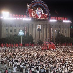 FILE - In this Aug. 15, 1990 file photo, some of the 100,000 people who gathered at Kim II Sung Square in Pyongyang, North Korea, to celebrate the 45th anniversary of the liberation of Korea from Japanese rule. Pyongyang likes to use big anniversaries to make high-profile statements with military activity or political provocations. It launched its first intercontinental ballistic missile, for example, on July 4, Independence Day in the United States. 
