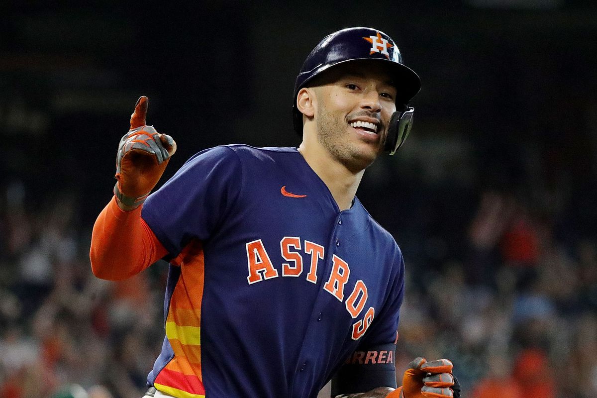 Carlos Correa #1 of the Houston Astros hits a home run in the eighth inning against the Oakland Athletics at Minute Maid Park on October 03, 2021 in Houston, Texas.