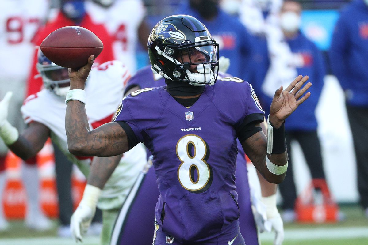 Quarterback Lamar Jackson #8 of the Baltimore Ravens looks to pass against the New York Giants during the third quarter at M&amp;T Bank Stadium on December 27, 2020 in Baltimore, Maryland.