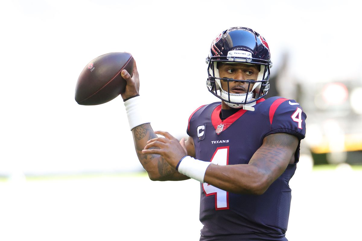 Deshaun Watson of the Houston Texans in action against the Tennessee Titans during a game at NRG Stadium on January 03, 2021 in Houston, Texas.