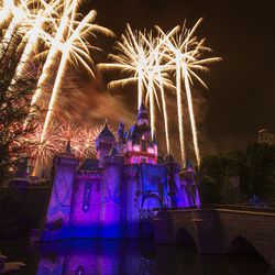 Fireworks illuminates the sky above Sleeping Beauty Castle. 
