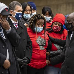 Flanked by family members and attorneys, Clifftina Johnson, mother of Tafara Williams, cries during a press conference outside Waukegan’s city hall complex, Tuesday morning, Oct. 27, 2020. Williams, 20, was wounded and her boyfriend, 19-year-old Marcellis Stinnette, was killed when they were both shot by a Waukegan police officer on Oct. 20.