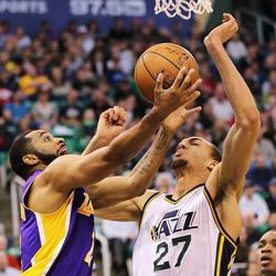Los Angeles Lakers guard Wayne Ellington (2) and Utah Jazz center Rudy Gobert (27) battle for the ball as the Jazz and the Lakers play Wednesday, Feb. 25, 2015, at EnergySolutions Arena in Salt Lake City.