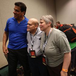 Lou Ferrigno, who plays the Hulk in "The Incredible Hulk," takes a photo with Melvin Farr and Melissa Farr during a press conference at Utah's first Comic Con at the Salt Palace Convention Center in Salt Lake City on Thursday, Sept. 5, 2013.