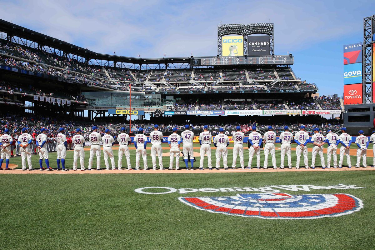 The Mets line the field on Opening Day 2014