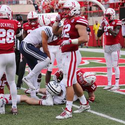 Nebraska Cornhuskers players are stunned as Brigham Young Cougars wide receiver Mitch Mathews (10) catches the game-winning Hail Mary touchdown against Nebraska in Lincoln, Nebraska, Saturday, Sept. 5, 2015. BYU won 33-28.