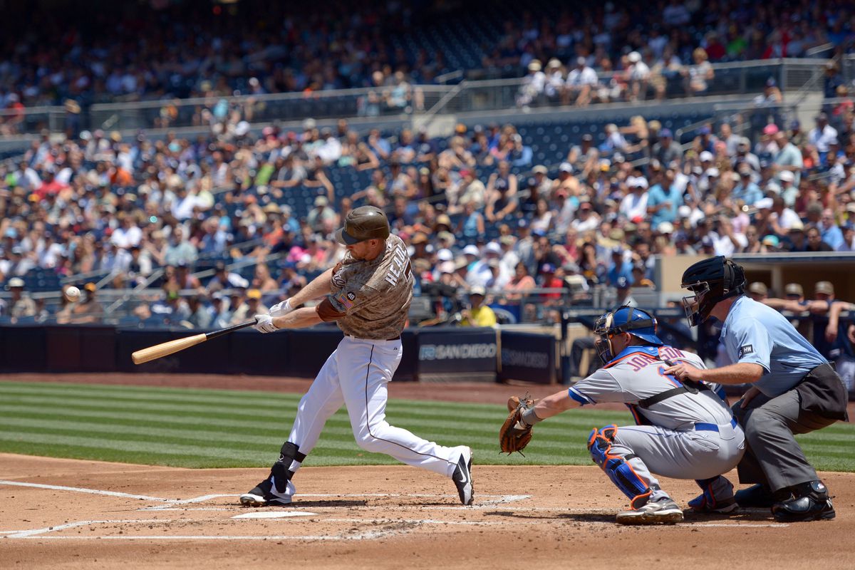 Aug 5, 2012; San Diego, CA, USA; San Diego Padres third baseman Chase Headley (7) hits a two run home run during the first inning against the New York Mets at Petco Park. Mandatory Credit: Jake Roth-US PRESSWIRE