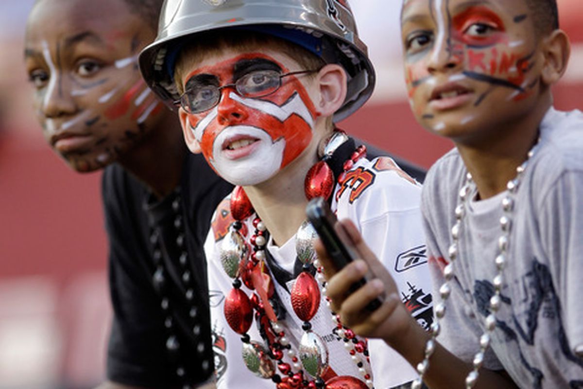 LANDOVER, MD - SEPTEMBER 01:  Tampa Bay Buccaneers fans watch warmups before the start of the Buccaneers preseason game against the Washington Redskins at FedExField on September 1, 2011 in Landover, Maryland.  (Photo by Rob Carr/Getty Images)