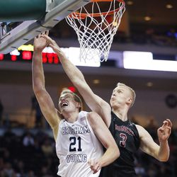 Brigham Young Cougars forward Kyle Davis (21) and Santa Clara Broncos forward Henrik Jadersten (3) compete for the ball during the WCC tournament in Las Vegas Saturday, March 5, 2016. BYU won 72-60. 