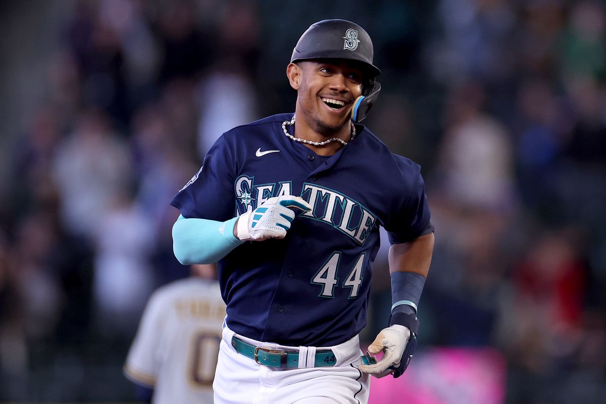 Julio Rodriguez of the Seattle Mariners celebrates his two-run home run against the Milwaukee Brewers during the second inning at T-Mobile Park on April 19, 2023 in Seattle, Washington.