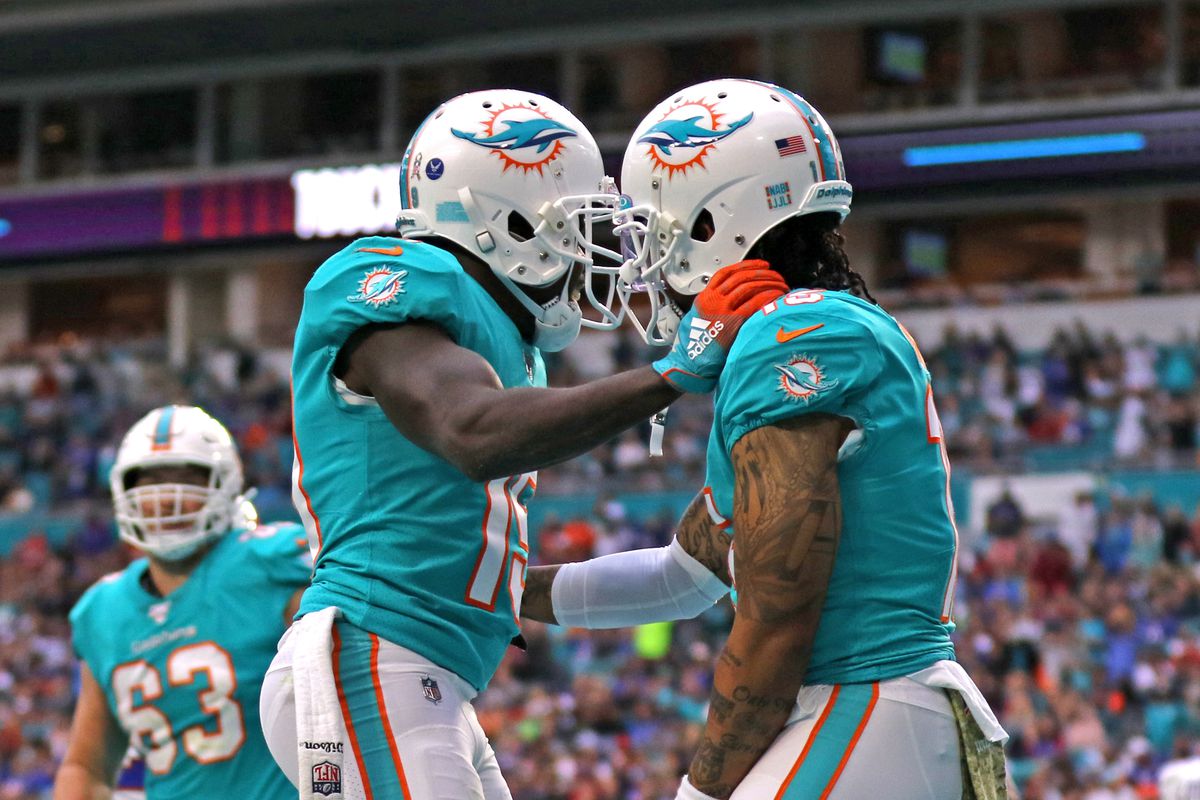 Miami Dolphins wide receiver Jakeem Grant and wide receiver Albert Wilson celebrate after scoring a touchdown against the Buffalo Bills in the fourth quarter at Hard Rock Stadium.