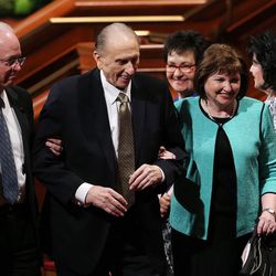 LDS Church President Thomas S. Monson and his daughter, Ann M. Dibb, exit the Conference Center in Salt Lake City following the morning session of the LDS Church’s 187th Annual General Conference on Sunday, April 2, 2017.