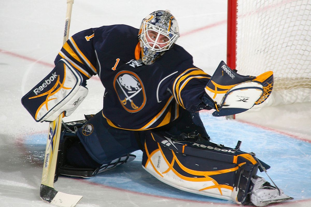 BUFFALO, NY - MARCH 30:  Jhonas Enroth #1 of the Buffalo Sabres makes a glove save against the New York Rangers at HSBC Arena on March 30, 2011 in Buffalo, New York.  (Photo by Rick Stewart/Getty Images)