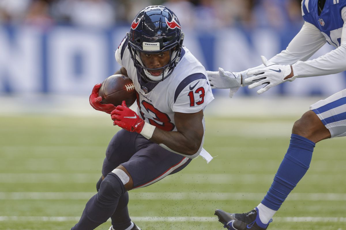 Brandin Cooks #13 of the Houston Texans runs the ball during the game against the Indianapolis Colts at Lucas Oil Stadium on October 17, 2021 in Indianapolis, Indiana.