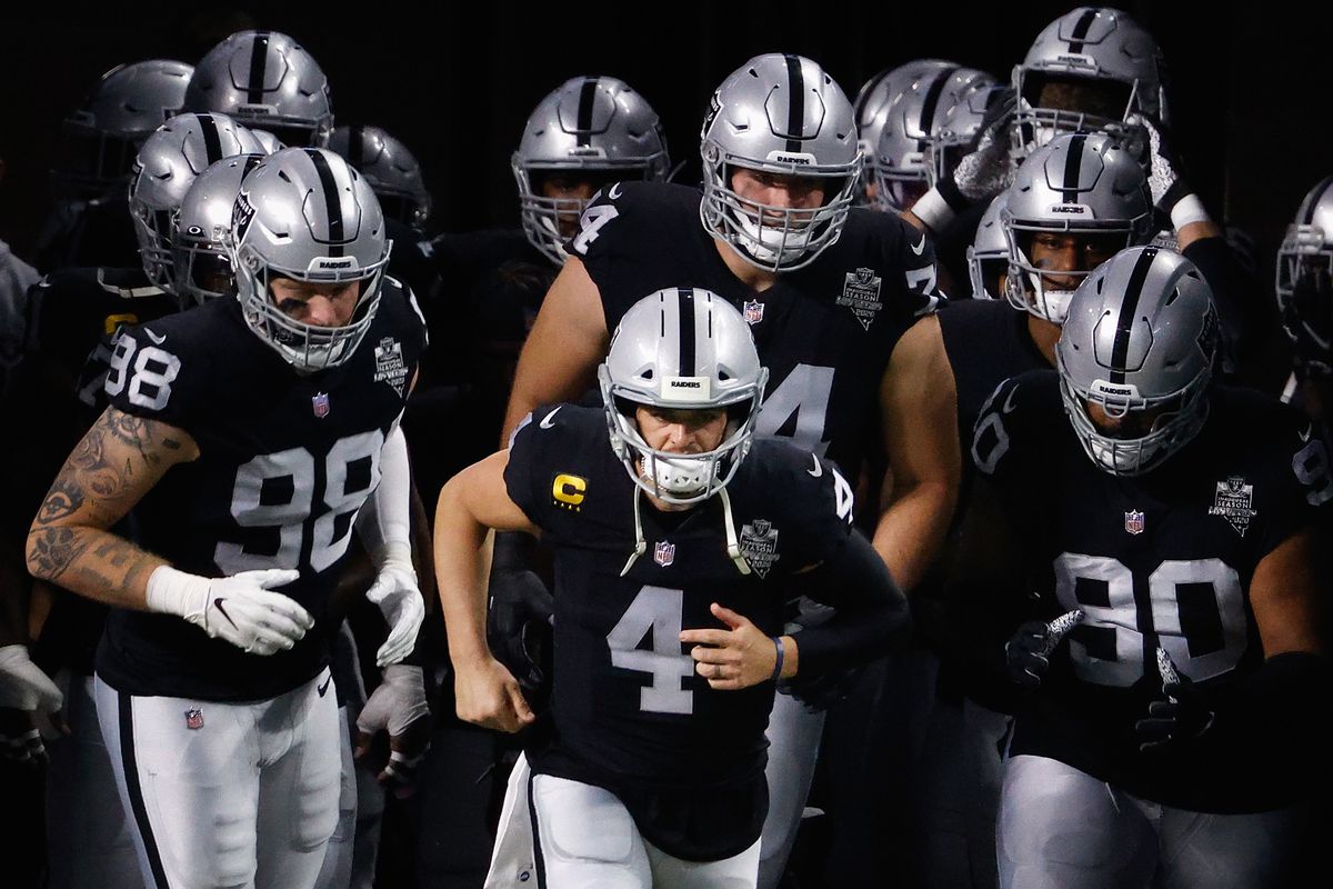 Quarterback Derek Carr #4 of the Las Vegas Raiders leads his team onto the field during the NFL game against the Los Angeles Chargers at Allegiant Stadium on December 17, 2020 in Las Vegas, Nevada. The Chargers defeated the Raiders in overtime 30-27.