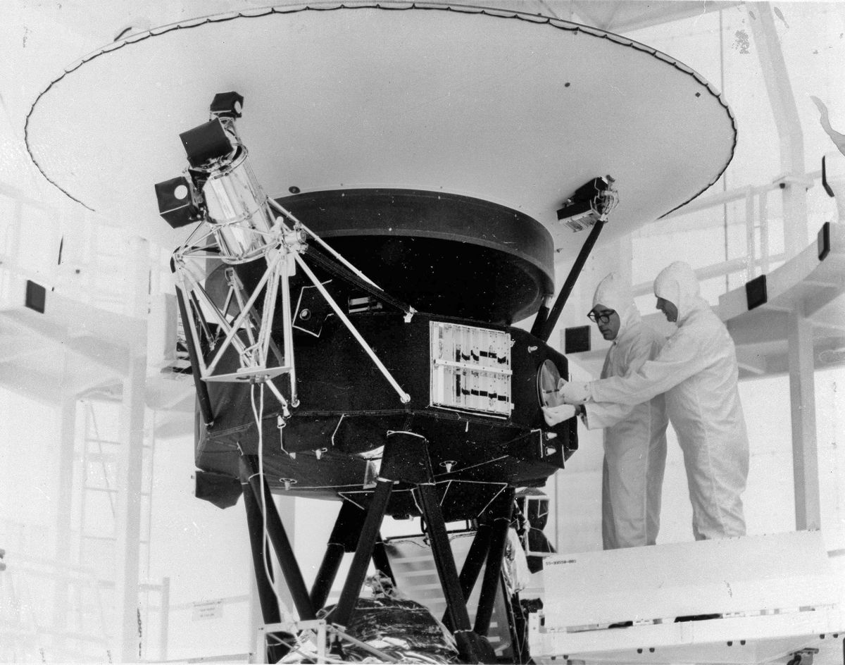FILE - In this Aug. 4, 1977 photo provided by NASA, the "Sounds of Earth" record is mounted on the Voyager 2 spacecraft in the Safe-1 Building at the Kennedy Space Center, Fla., prior to encapsulation in the protective shroud. Sunday, Aug. 20, 2017 marks 