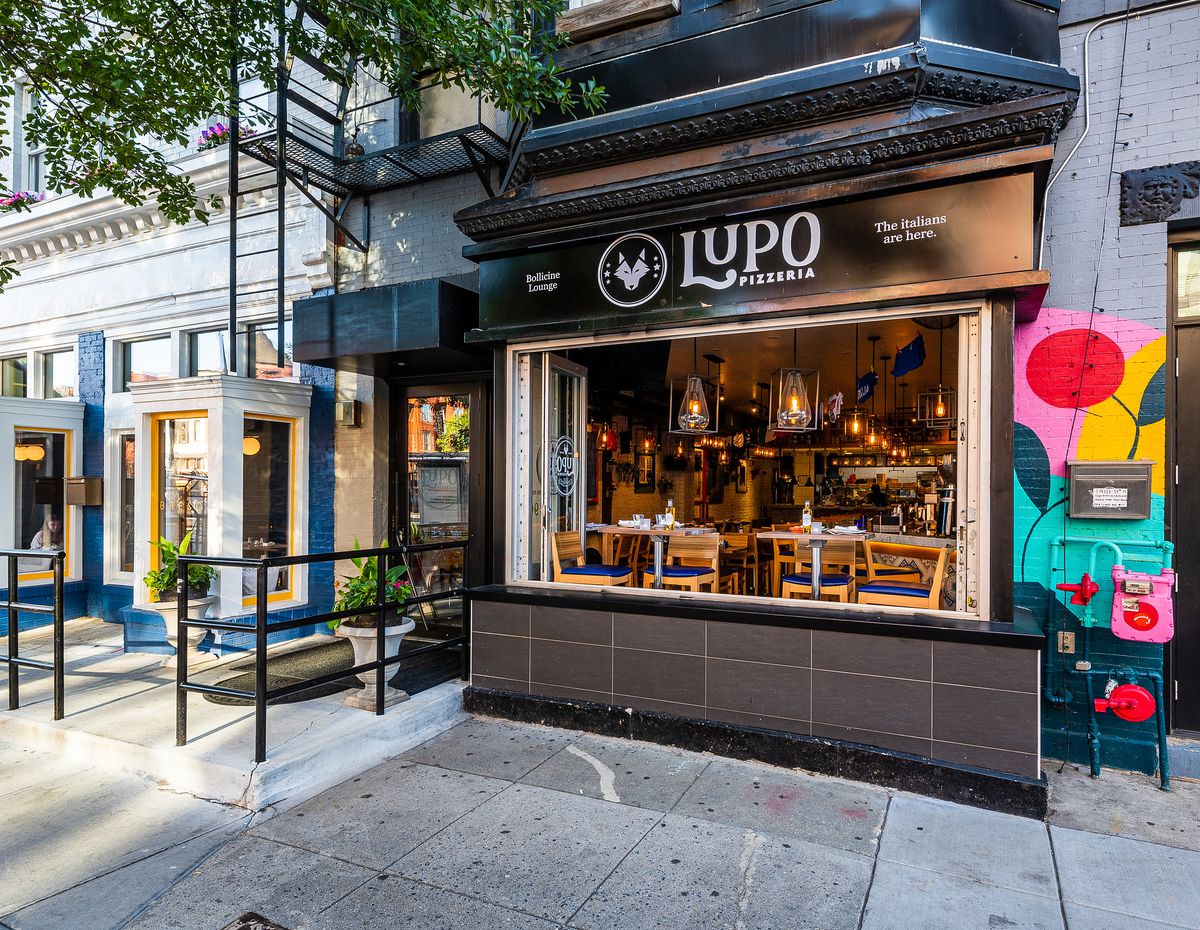 Lupo Pizzeria’s open front window on 14th Street NW