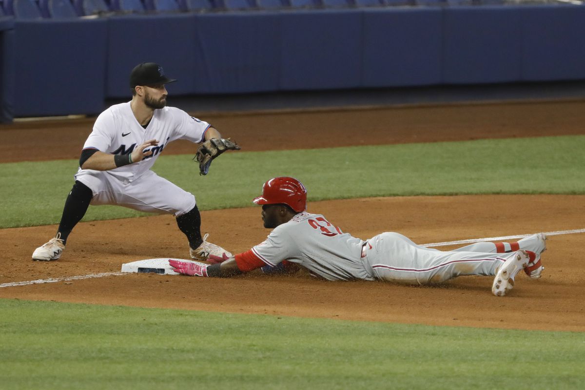 &nbsp;Philadelphia Phillies center fielder Odubel Herrera (37) slides onto third base after connecting for a triple during the ninth inning of the game against the Miami Marlins at loanDepot Park.