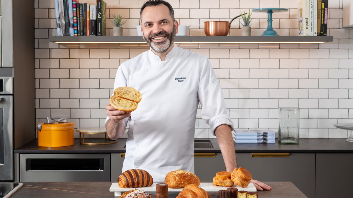 Dominique Ansel poses with pastries