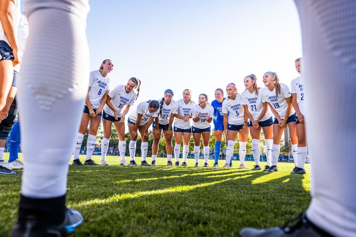 Members of the BYU women’s soccer team huddle after game against Missouri on Sept. 11, 2021 at South Field in Provo.
