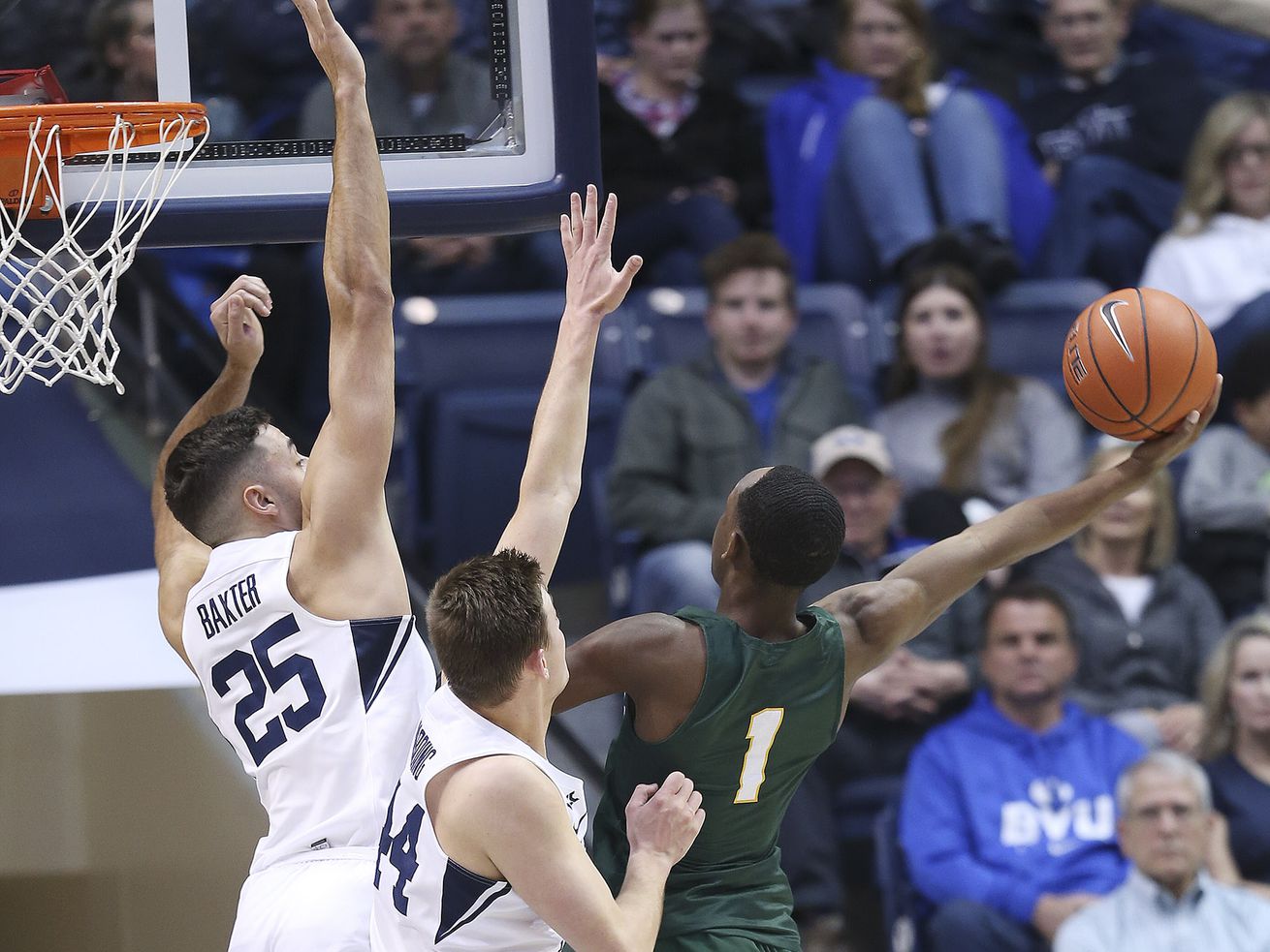 San Francisco Dons guard Jamaree Bouyea (1) tries to drive on Brigham Young Cougars guard Connor Harding (44) and Brigham Young Cougars forward Gavin Baxter (25) in Provo on Saturday, Feb. 8, 2020.