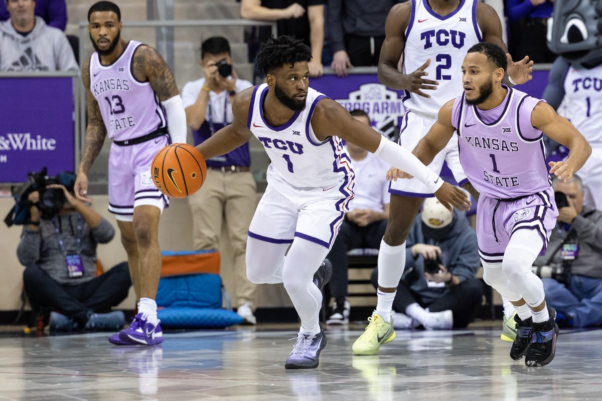 TCU Horned Frogs guard Mike Miles Jr. dribbles the ball as Kansas State Wildcats guard Markquis Nowell defends during the college basketball game between the TCU Horned Frogs and Kansas State Wildcats on January 14, 2023 at Ed &amp; Rae Schollmaier Arena in Fort Worth, Texas.