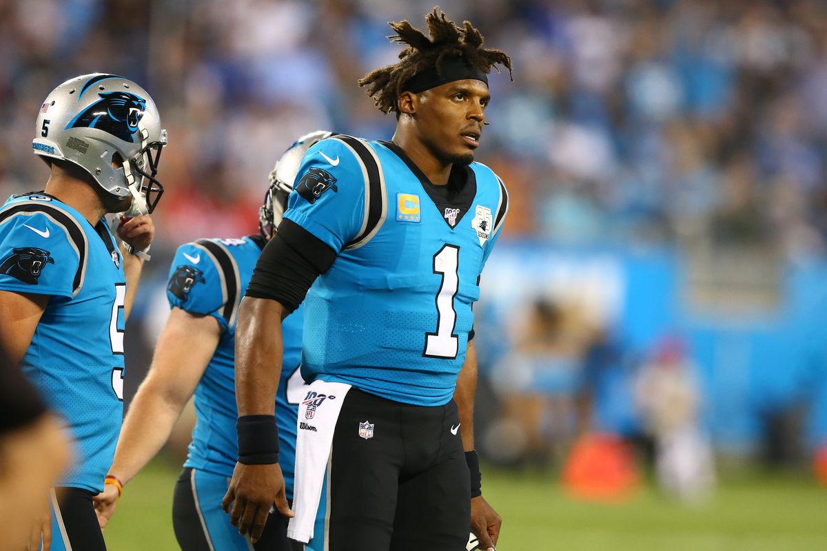 Carolina Panthers quarterback Cam Newton (1) walks off the field during the second quarter against the Tampa Bay Buccaneers at Bank of America Stadium.