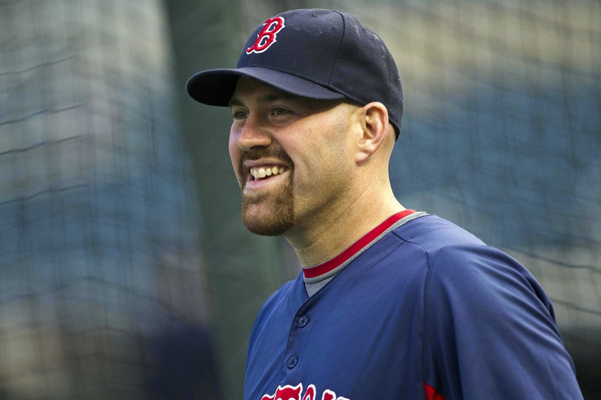 Apr 23, 2012; Minneapolis, MN, USA: Boston Red Sox third baseman Kevin Youkilis (20) looks on during batting practice before a game against the Minnesota Twins at Target Field. Mandatory Credit: Jesse Johnson-US PRESSWIRE