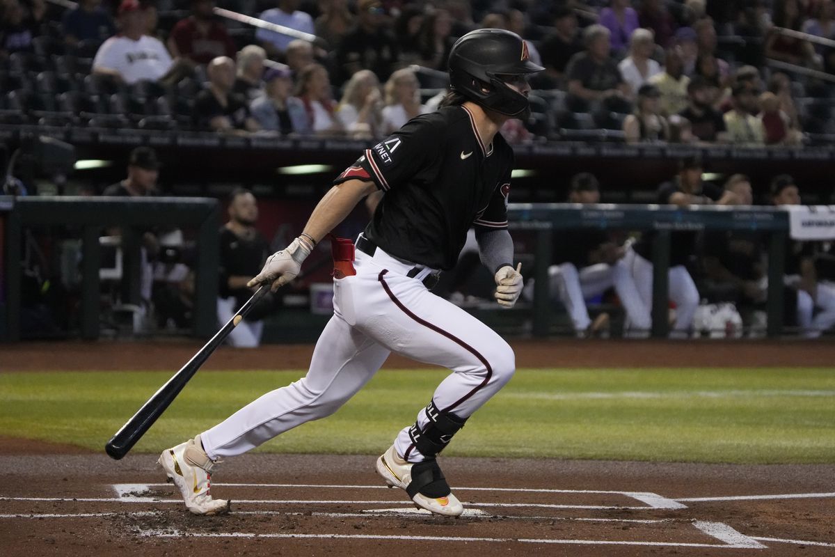 Arizona Diamondbacks left fielder Corbin Carroll hits a double against the Washington Nationals in the first inning at Chase Field.&nbsp;