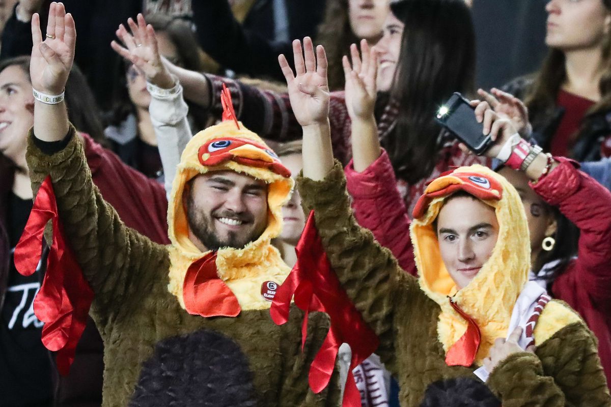 Nov 25, 2017; Columbia, SC, USA; Two South Carolina Gamecocks fans dressed for the holiday during the second half between the South Carolina Gamecocks and the Clemson Tigers at Williams-Brice Stadium. Mandatory Credit: Jim Dedmon-USA TODAY Sports