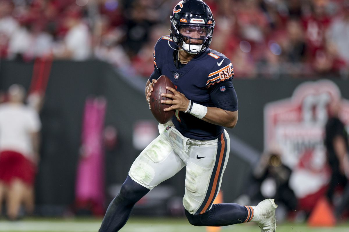 Justin Fields #1 of the Chicago Bears scrambles during the fourth quarter against the Tampa Bay Buccaneers at Raymond James Stadium on October 24, 2021 in Tampa, Florida.