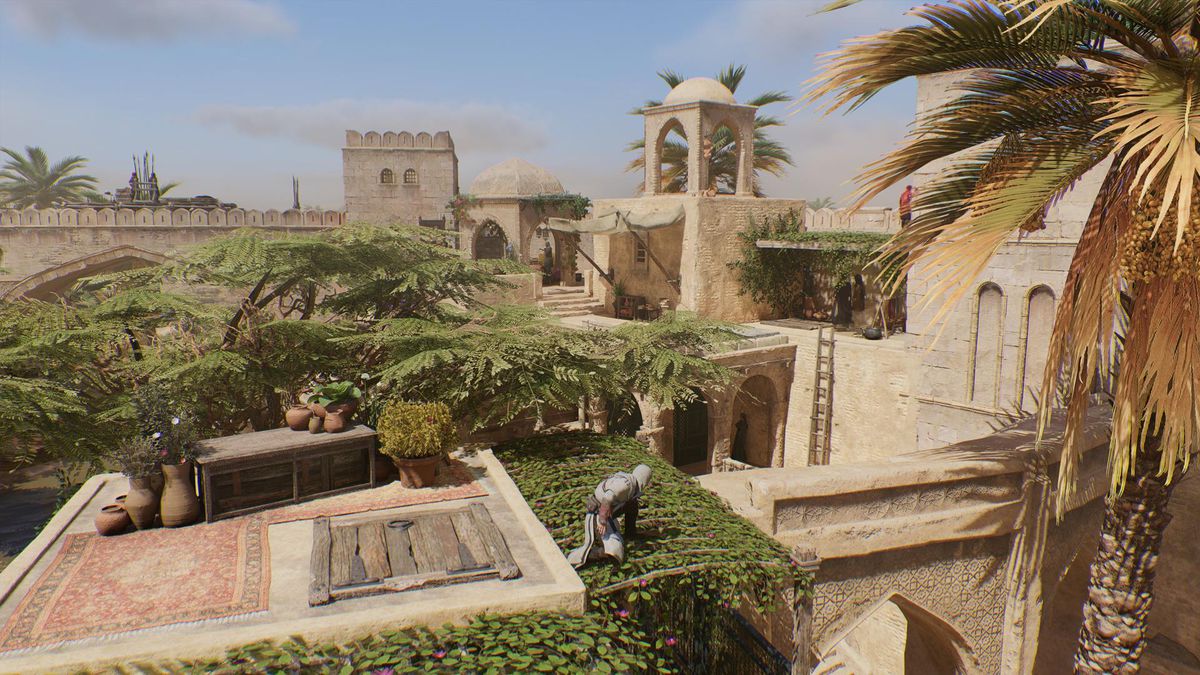Basim stands on the roof of a house looking for a Lost Book in Abbasiyah in AC Mirage.