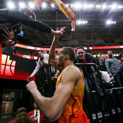 Utah Jazz center Rudy Gobert (27) throws his towel to fans as he leaves the court after the Jazz won 129-99 over the Golden State Warriors at Vivint Smart Home Arena in Salt Lake City on Tuesday, Jan. 30, 2018.