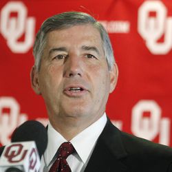 Big 12 Commissioner Bob Bowlsby answers a question during a news conference in Norman, Oklahoma, in 2012.