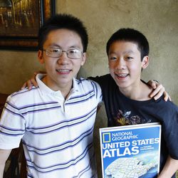 Anthony Chang, left, has been to the finals of the National Geographic Bee three times and is now prepping his younger brother, Alex, on Wednesday, April 3, 2013, in Sandy.