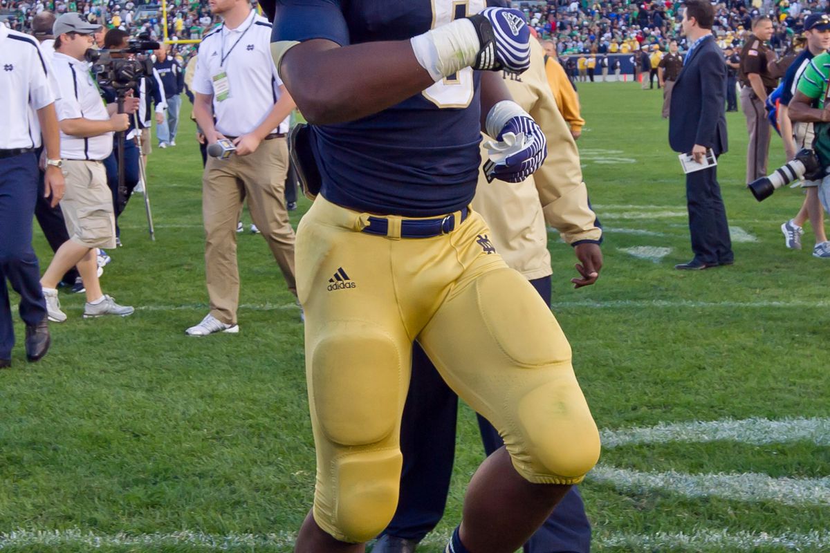 Sep 8, 2012; South Bend, IN, USA; Notre Dame Fighting Irish running back Theo Riddick (6) celebrates after Notre Dame defeated the Purdue Boilermakers 20-17 at Notre Dame Stadium. Mandatory Credit: Matt Cashore-US PRESSWIRE