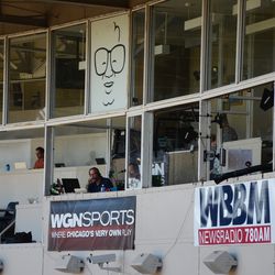 4:13 p.m. Broadcast banners, hanging in front of the broadcast booths - 