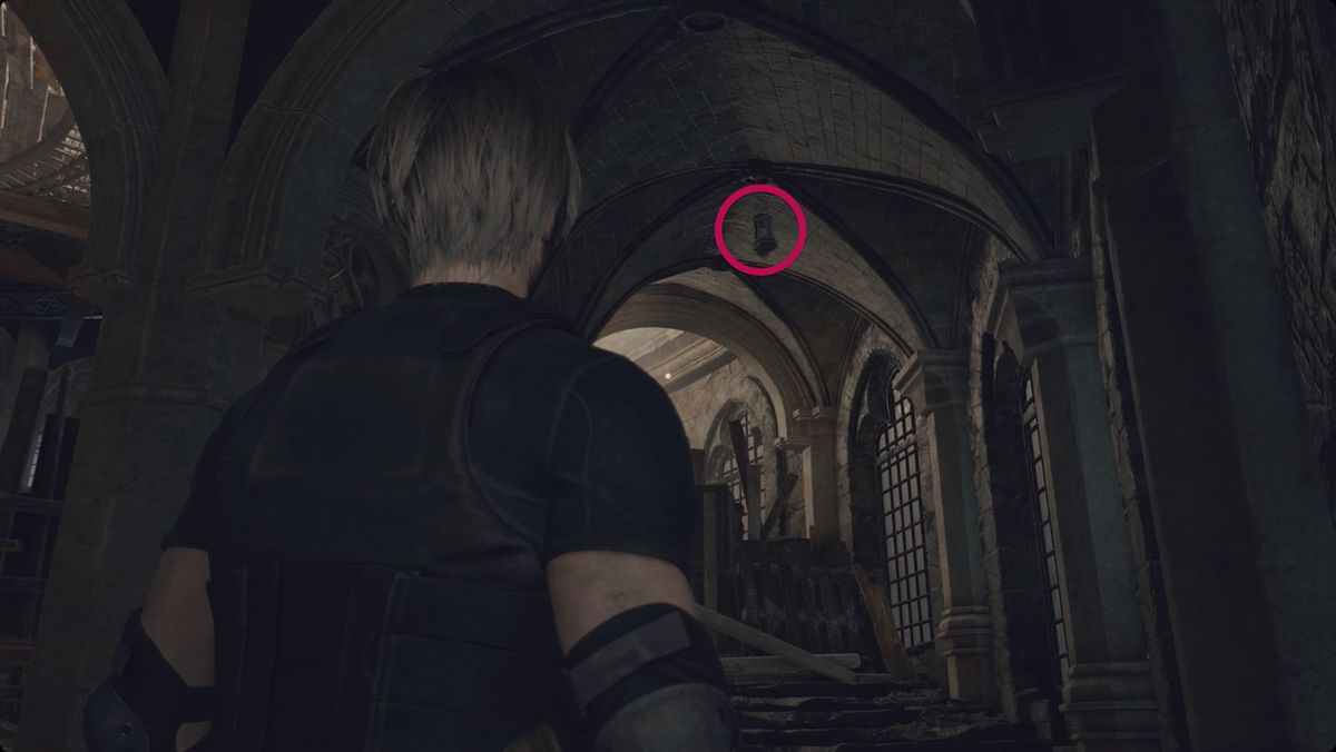 Resident Evil 4 remake Leon looking at a lantern in the Clock Tower