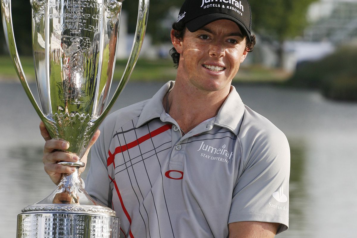 Sep 9, 2012; Carmel, IN, USA; Rory McIlroy poses with the Western Golf Association Open Championship Cup after winning the BMW Championship at Crooked Stick Golf Club. Mandatory Credit: Brian Spurlock-US PRESSWIRE